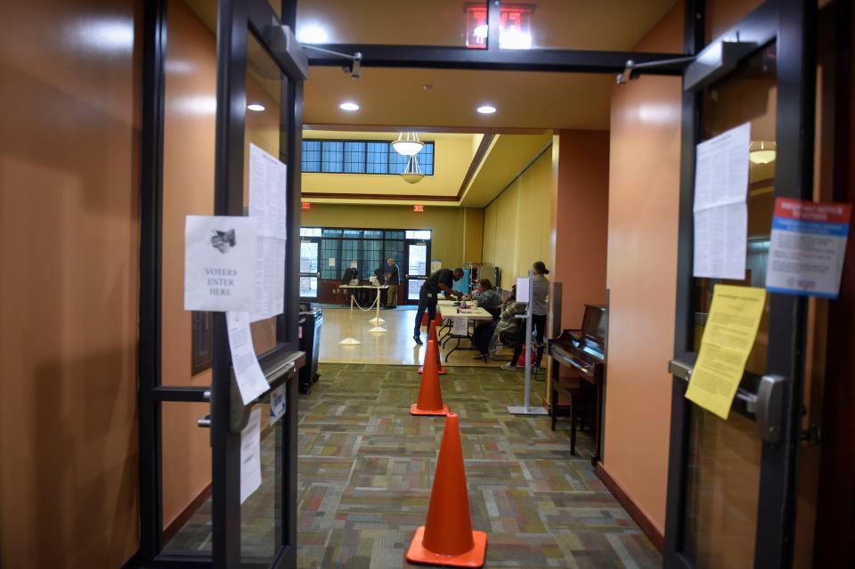 Voters check in as polls open at The Salvation Army Kroc Center of Augusta on Tuesday, Nov. 8, 2022. 