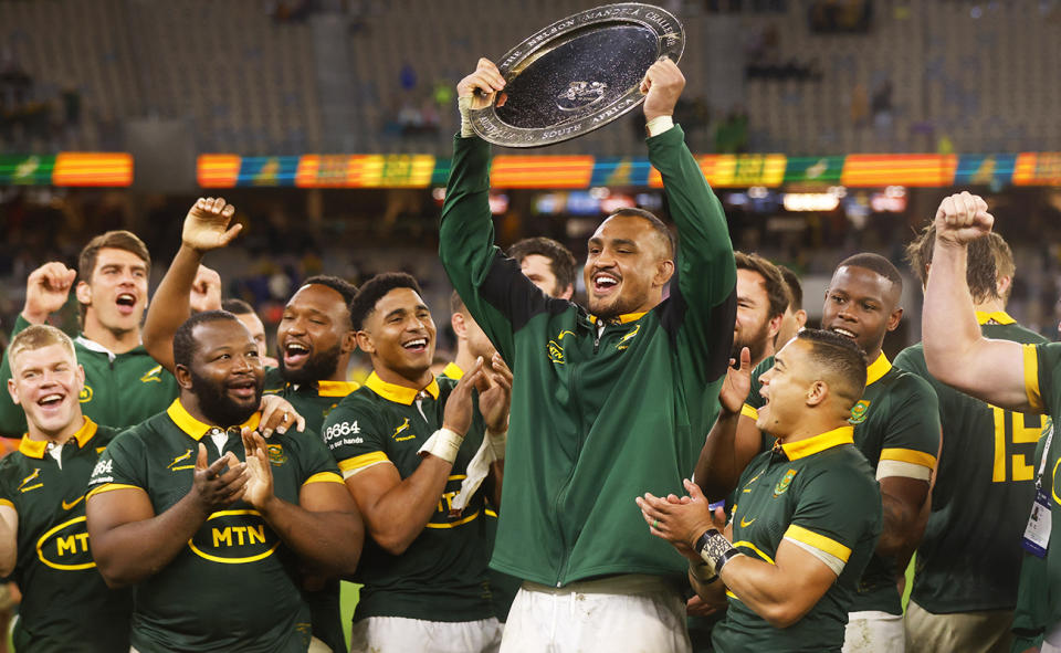 Springboks players, pictured here with the Nelson Mandela Plate after their win over the Wallabies.