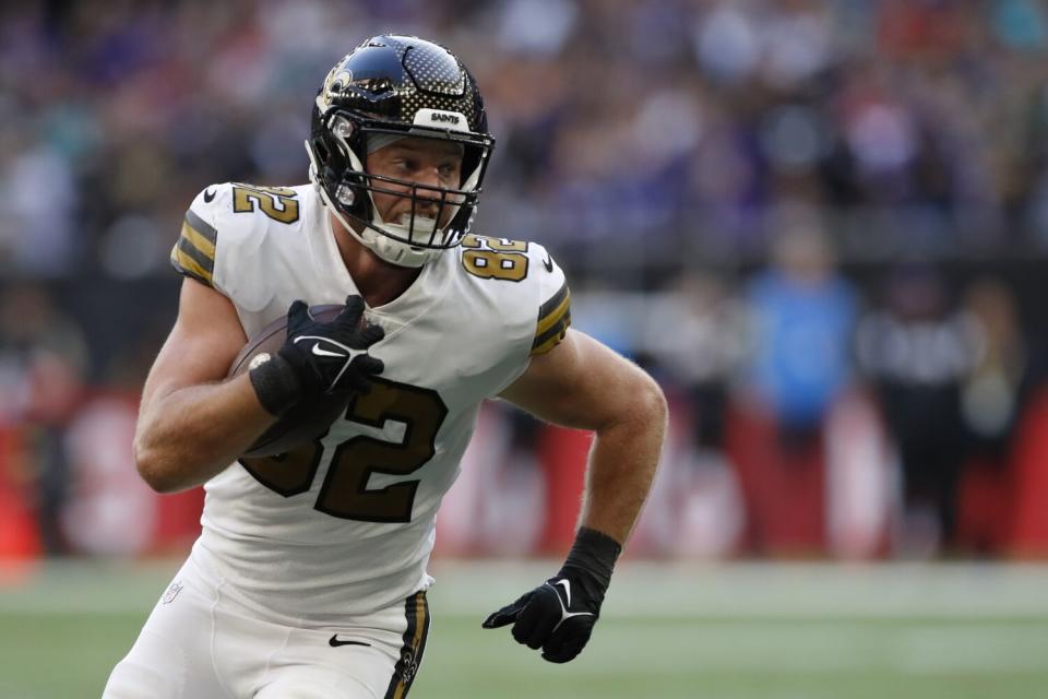 New Orleans Saints tight end Adam Trautman runs the ball up the field during against the Minnesota Vikings.