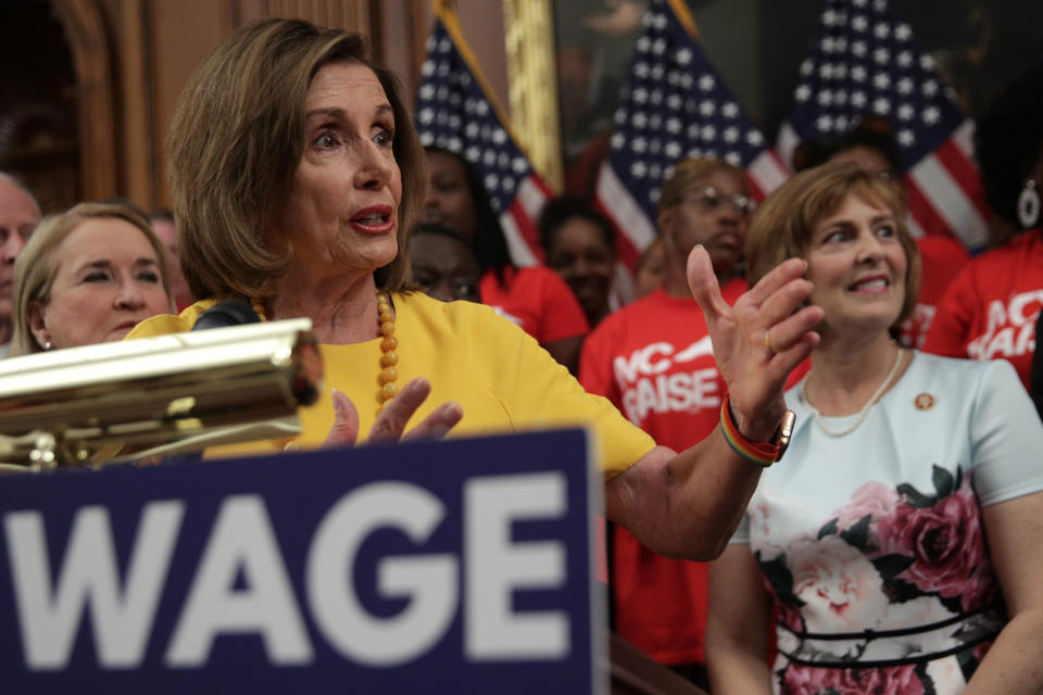 House Speaker Nancy Pelosi said the bill to increase the federal minimum wage would provide a "well-earned raise." (Photo: Alex Wong via Getty Images)