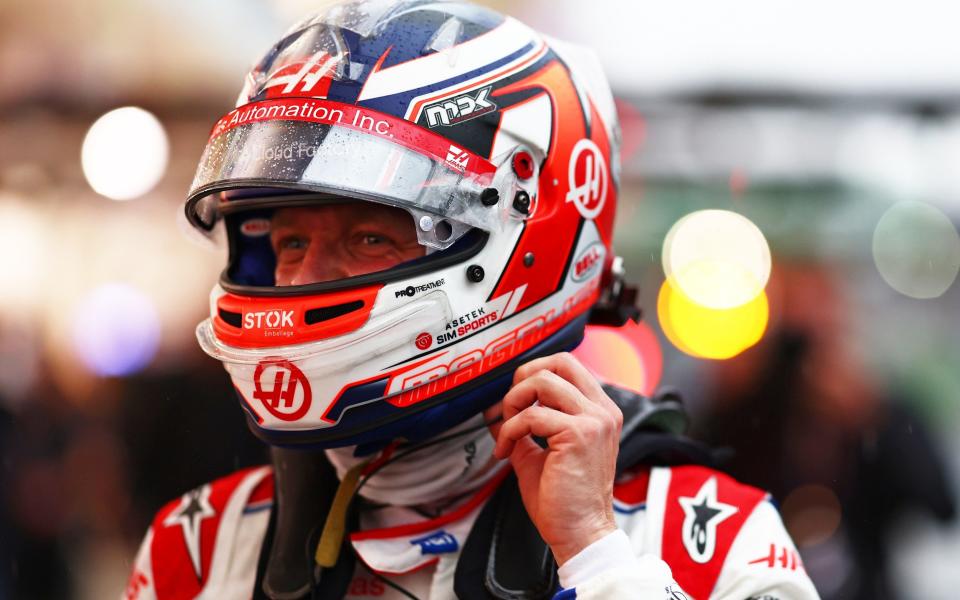 Pole position qualifier Kevin Magnussen of Denmark and Haas F1 walks into parc ferme during qualifying ahead of the F1 Grand Prix of Brazil at Autodromo Jose Carlos Pace on November 11, 2022 in Sao Paulo, Brazil. - Mark Thompson/Getty Images