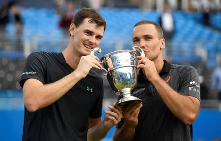 Tennis - Aegon Championships - Queen’s Club, London, Britain - June 25, 2017 Great Britain's Jamie Murray and Brazil's Bruno Soares celebrate with the trophy after winning the final against France's Julien Benneteau and Edouard Roger-Vasselin Action Images via Reuters/Tony O'Brien