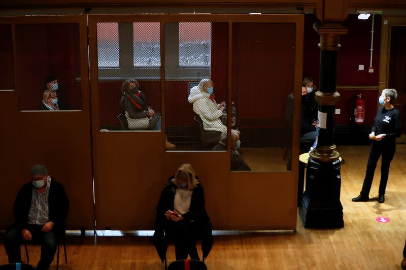 Patients wait to receive their vaccinations at the Hartlepool Town Hall Theatre vaccination centre, as the spread of the coronavirus disease (COVID-19) continues in Hartlepool