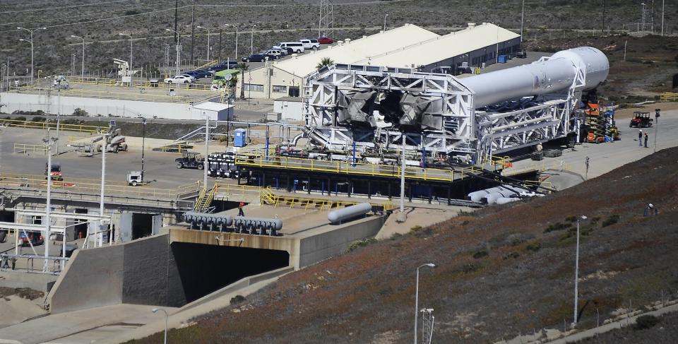 A SpaceX upgraded Falcon 9 rocket undergoes launch preparations at Vandenberg Air Force Base in California