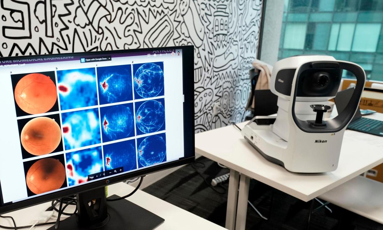 <span>‘The optimistic consensus is based on a vision of AI’s role in analysing medical health records and diagnostics, such as the early detection of Parkinson’s from eye scans.’</span><span>Photograph: Monica M Davey/EPA</span>