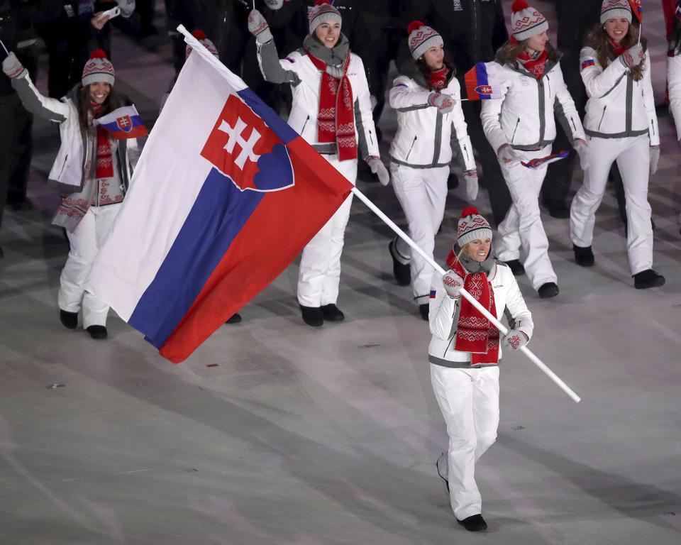 <p>Veronika Velez Zuzulova carries the flag of Slovakia during the opening ceremony of the 2018 Winter Olympics in Pyeongchang, South Korea, Friday, Feb. 9, 2018. (Sean Haffey/Pool Photo via AP) </p>