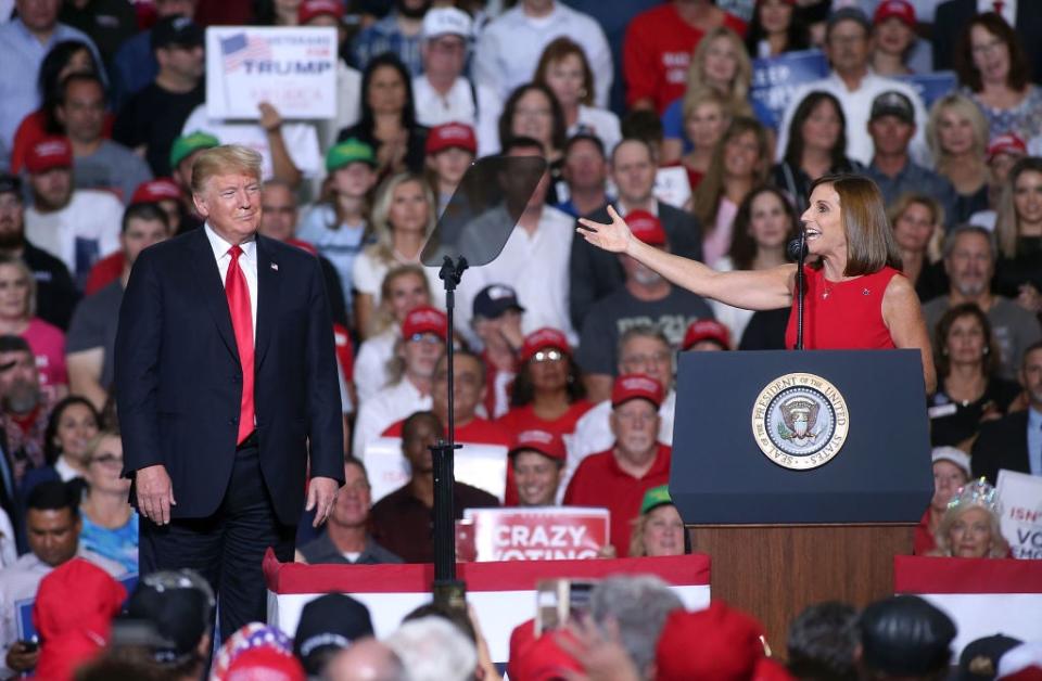 Ms McSally with president Trump at 2018 Arizona rallyGetty Images