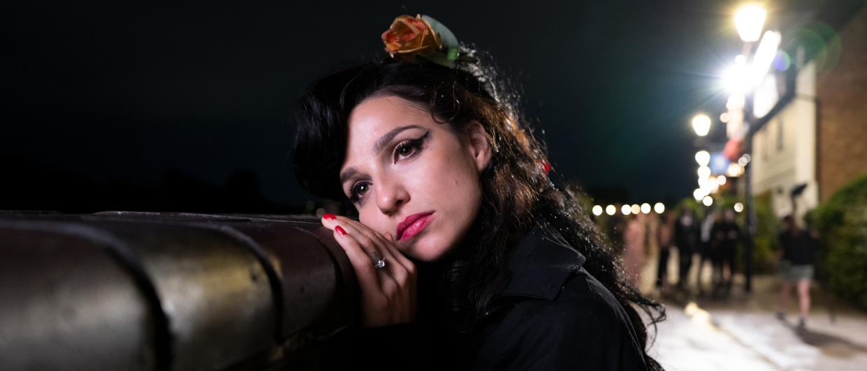 Marisa Abela as Amy Winehouse looking out in the distance while in London after Grammy wins. 