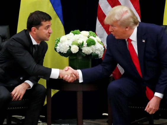 Ukraine's President Volodymyr Zelenskiy greets US President Donald Trump during a bilateral meeting on the sidelines of the 74th session of the United Nations General Assembly (UNGA) in New York City, New York, US, 25 September (Reuters)