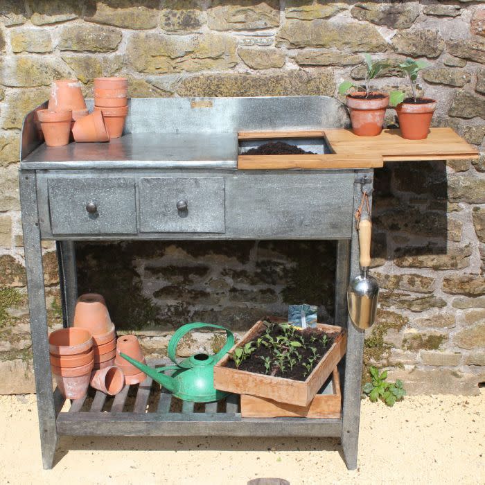 <p>This lightweight potting table has useful carry handles, and lots of storage with two drawers, a shelf and an extendable worktop that reveals a handy compost store. It's made from galvanised steel and recycled teak for durability. </p><p><a class="link " href="https://www.wilstone.com/shop/view/8431-Potting-Table" rel="nofollow noopener" target="_blank" data-ylk="slk:BUY NOW;elm:context_link;itc:0;sec:content-canvas">BUY NOW</a> <strong>£325</strong></p>