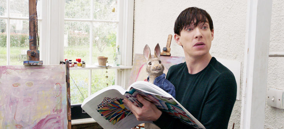 Domhnall Gleeson cuddles up with the titular bunny in <em>Peter Rabbit.</em> (Photo: Columbia Pictures/Courtesy Everett Collection)