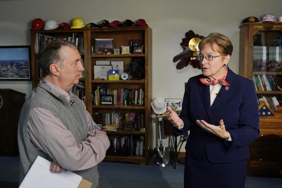 U.S. Rep. Marcy Kaptur, D-Ohio, talks with Associated Press correspondent John Seewer after an interview, Friday, Dec. 9, 2022, in Toledo, Ohio. When the new Congress convenes on Tuesday, Rep. Kaptur will become the longest-serving woman in its history. First elected to Congress in 1982, Kaptur will set the mark for the longest tenure by a woman in the House or Senate, surpassing former Sen. Barbara Mikulski, a Maryland Democrat who retired at the end of 2017. (AP Photo/Carlos Osorio)