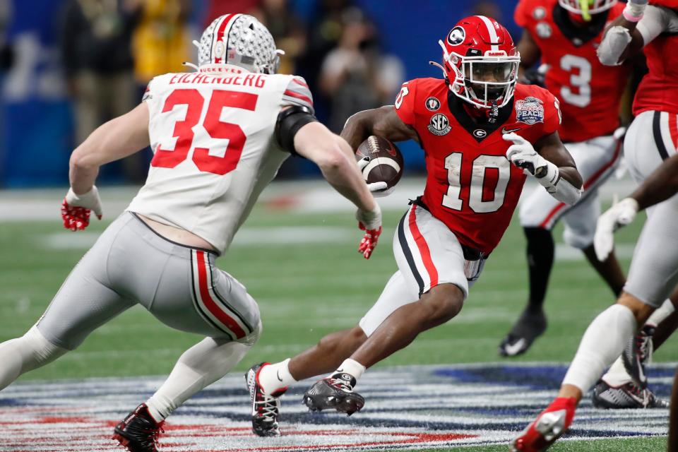 Georgia wide receiver Kearis Jackson (10) moves the ball during the second half of the Chick-fil-A Peach Bowl NCAA College Football Playoff semifinal game between Ohio State and Georgia on Saturday, Dec 31, 2022, in Atlanta. Georgia won 42-41.