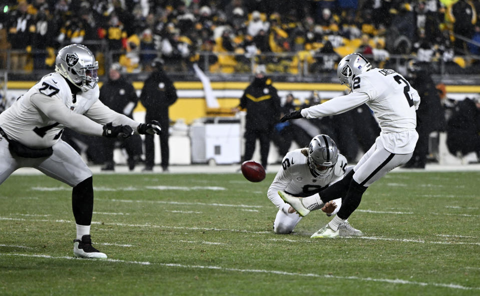 PITTSBURGH, PENNSYLVANIA – DECEMBER 24: <a class="link " href="https://sports.yahoo.com/nfl/players/31137" data-i13n="sec:content-canvas;subsec:anchor_text;elm:context_link" data-ylk="slk:Daniel Carlson;sec:content-canvas;subsec:anchor_text;elm:context_link;itc:0">Daniel Carlson</a> #2 of the Las Vegas Raiders kicks a field goal during the second quarter against the Pittsburgh Steelers at Acrisure Stadium on December 24, 2022 in Pittsburgh, Pennsylvania. (Photo by Gaelen Morse/Getty Images)