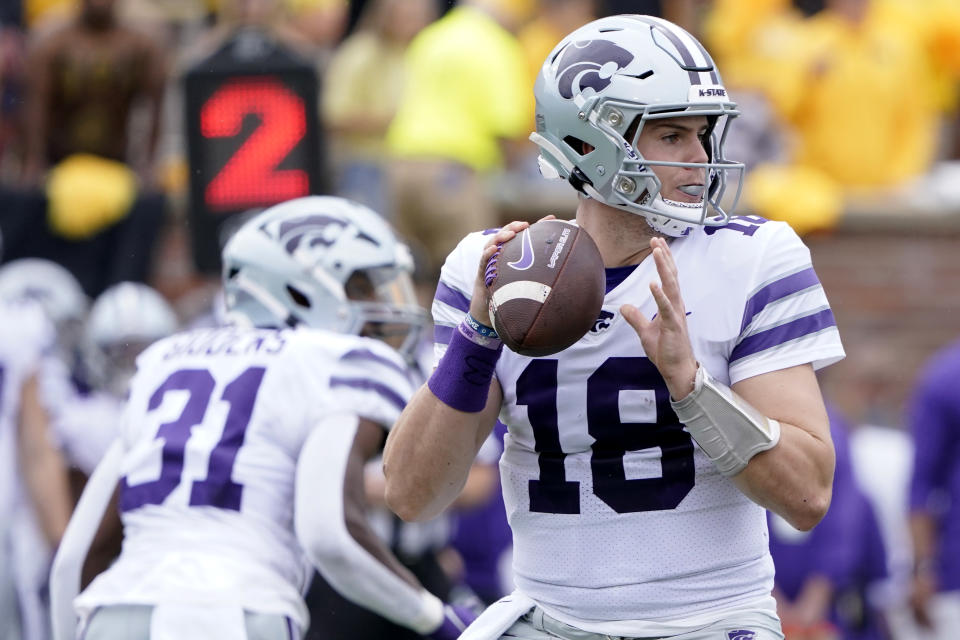 COLUMBIA, MISSOURI - SEPTEMBER 16: Quarterback Will Howard #18 of the Kansas State Wildcats looks to pass against the Missouri Tigers in the first half at Faurot Field/Memorial Stadium on September 16, 2023 in Columbia, Missouri. (Photo by Ed Zurga/Getty Images)