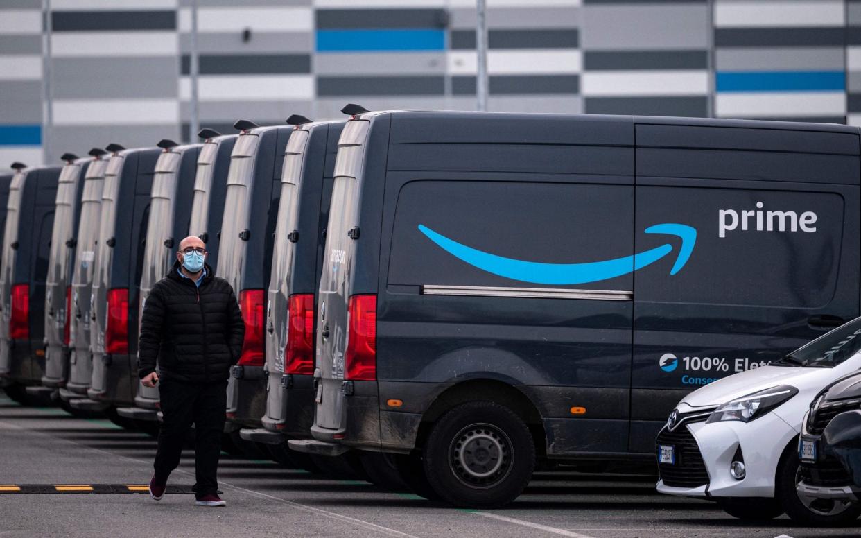 Amazon delivery trucks - MARCO BERTORELLO /AFP