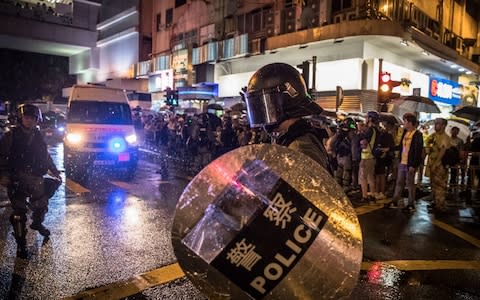 Riot police in Tsuen Wan, Hong Kong, China, 25 August 2019 - Credit: ROMAN PILIPEY/EPA-EFE/REX/REX