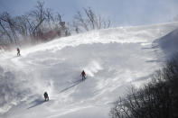 <p>Skiers traverse the course where the technical events will be held before a free skiing session by competitors in the women’s giant slalom at the Yongpyong Alpine Center at the 2018 Winter Olympics in Pyeongchang, South Korea, Sunday, Feb. 11, 2018. The men’s downhill at nearby Jeongseon alpine venue was postponed Sunday due to high winds. (AP Photo/Christophe Ena) </p>