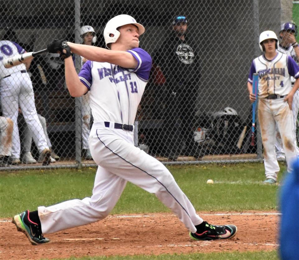 Iain Farber follows through on the swing that produced his second home run of the West Canda Valley Nighthawks' Tuesday game against Poland. The home runs were the second and third of his senior season.