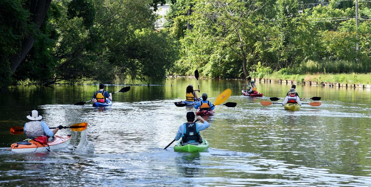 Kat Gardiner, park guide and kayak program manager at the River Raisin National Battlefield Park, leads a small group around Sterling Island on the River Raisin. The River Raisin National Battlefield Park moved its kayak program to Hellenberg Park from Hull's Trace in Brownstown Township in 2019.