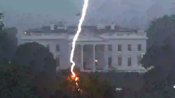 PHOTO: A lightning strike hits a tree in Lafayette Park across from the White House, killing two people and injuring two others, during a thunderstorm as seen in this framegrab from a video camera mounted on a nearby rooftop in Washington, Aug. 4, 2022. (Reuters Tv/Reuters)