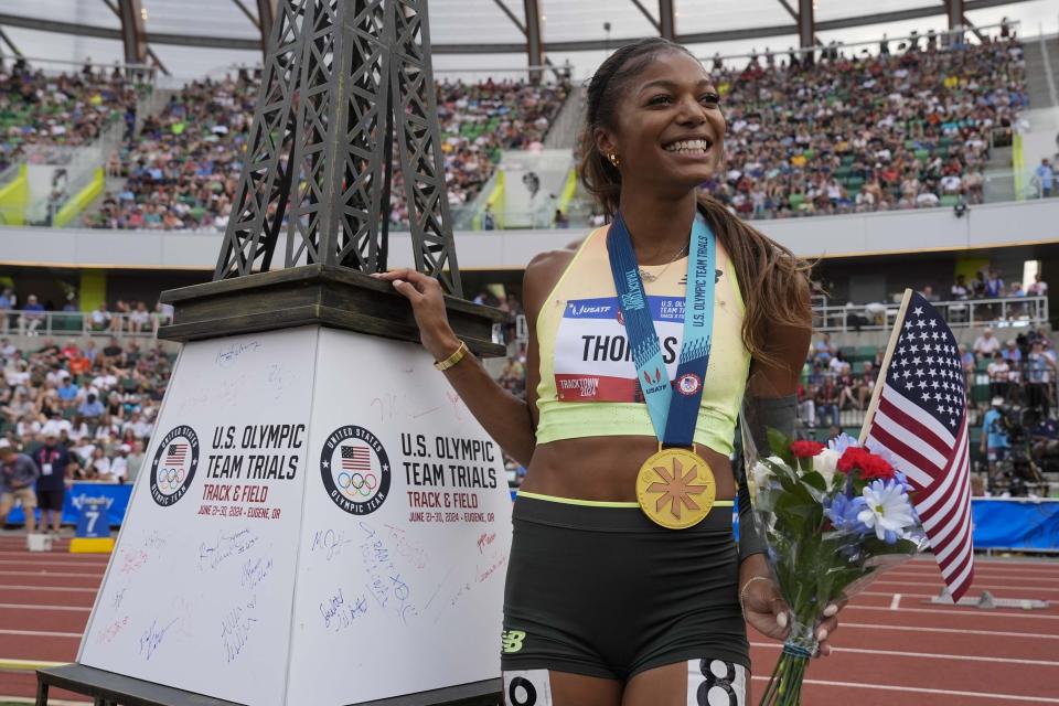 Gabby Thomas celebrates after winning the women's 200-meter final during the U.S. Track and Field Olympic Team Trials Saturday, June 29, 2024, in Eugene, Ore. (AP Photo/George Walker IV)