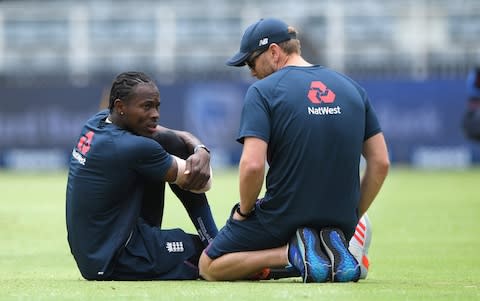 England bowler Jofra Archer chats with physio Craig de Weyman during the warm up during Day One of the Fourth Test between South Africa and England at The Wanderers on January 24, 2020 in Johannesburg, South Africa - Credit: Getty Images