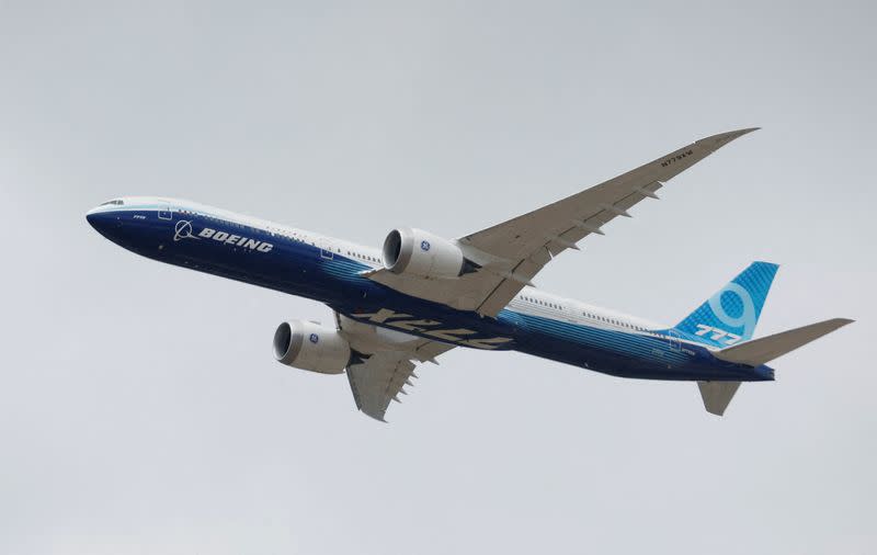 FILE PHOTO: A Boeing 777X aircraft during a display at the Farnborough International Airshow, in Farnborough