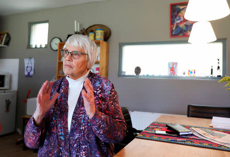 Clara Jas sits at her table in her house in Zwolle, the Netherlands April 3, 2018. Picture taken April 3, 2018. REUTERS/Michael Kooren