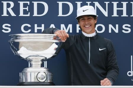 Golf - Alfred Dunhill Links Championship - St. Andrews, Scotland - 4/10/15 Denmark's Thorbjorn Olesen celebrates with the trophy after winning the Alfred Dunhill Links Championship Mandatory Credit: Action Images / Jason Cairnduff Livepic