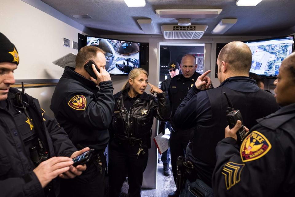 Kristen Ziman, who has Collier County and law enforcement ties, was named recently to a team helping the critical incident review of the law enforcement response to the mass shooting on May 24 in Uvalde, Texas. The retired Aurora, Illinois, police chief is shown here directing her department's response to a February 2019 mass casualty shooting in the Illinois city.