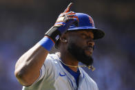 New York Mets' Starling Marte celebrates as he runs the bases after hitting a home run during the sixth inning of a baseball game against the Los Angeles Dodgers in Los Angeles, Saturday, April 20, 2024. Zack Short and Brandon Nimmo also scored. (AP Photo/Ashley Landis)