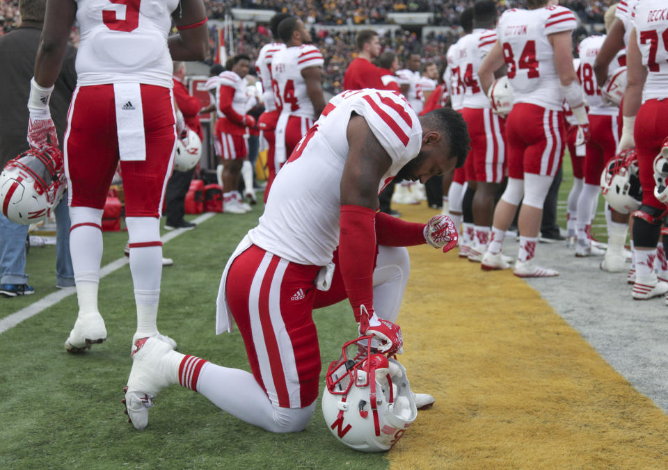 Michael Rose-Ivey #15 of the Nebraska Cornhuskers kneels during the National Anthem before the match-up against the Iowa Hawkeyes, on November 25, 2016 at Kinnick Stadium in Iowa City, Iowa. (Photo by Matthew Holst/Getty Images)