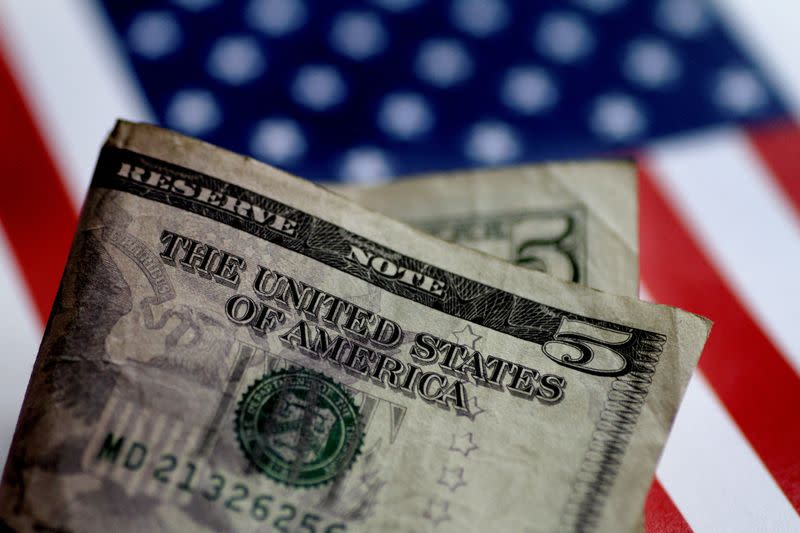 FILE PHOTO: Illustration photo of a U.S. five dollar note