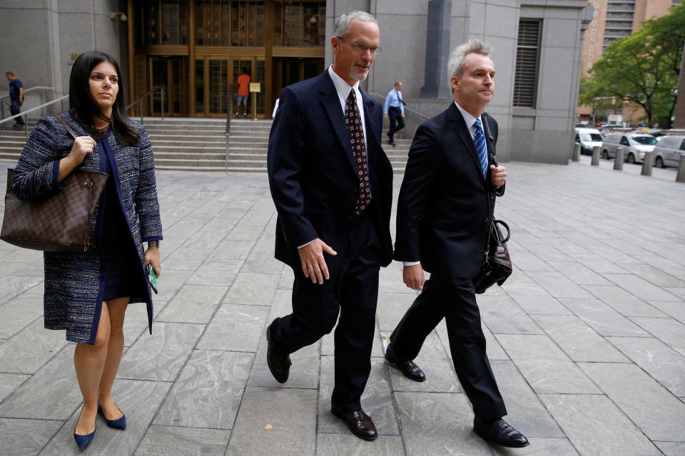 interest rate Matthew Connolly (C), a former Deutsche Bank director, exits the Manhattan federal courthouse with his lawyer in New York City, U.S., September 28, 2016. REUTERS/Brendan McDermid