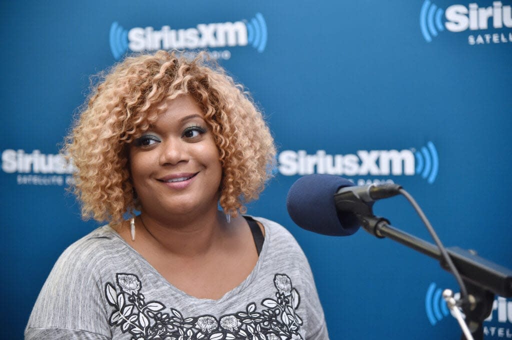 Sunny Anderson (L) is interviewed during SiriusXM’s “Food Talk” on October 17, 2014 in New York City. (Photo by Mike Coppola/Getty Images for SiriusXM)