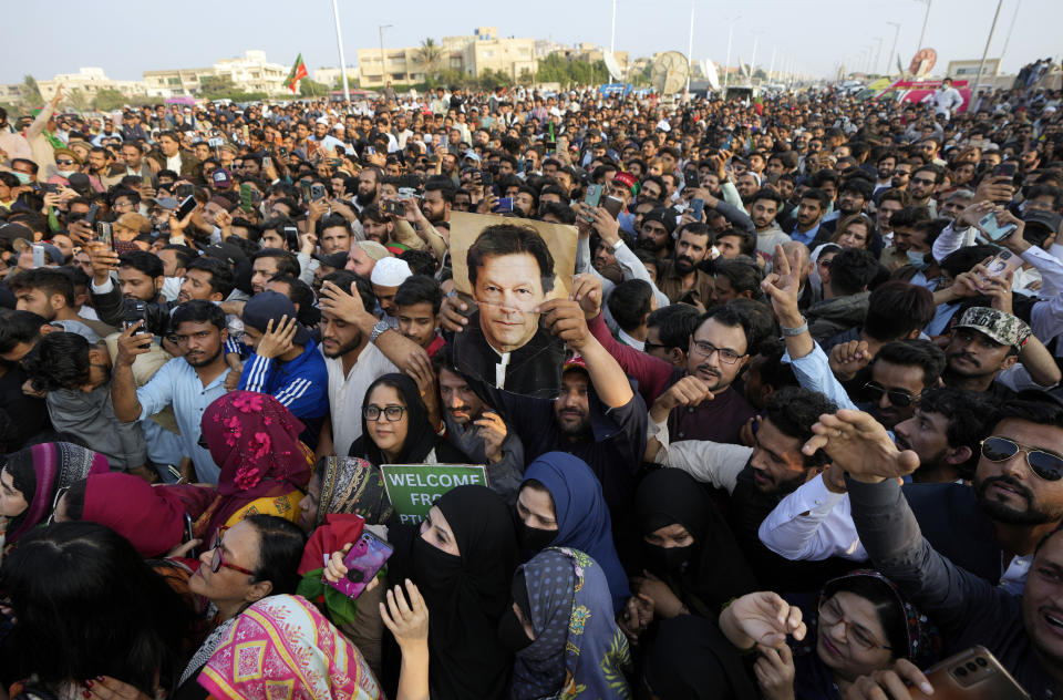 Supporters of Pakistan Tehreek-e-Insaf (PTI) a political party of former Pakistani Prime Minister Imran Khan, hold a rally against the decision of election commission for the electoral symbol of a cricket bat, Sunday, Jan. 14, 2024. (AP Photo/Fareed Khan)