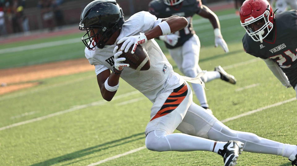 Withrow wide receiver Chris Henry Jr. catches a pass during their scrimmage against Princeton, Friday, Aug. 11, 2023.