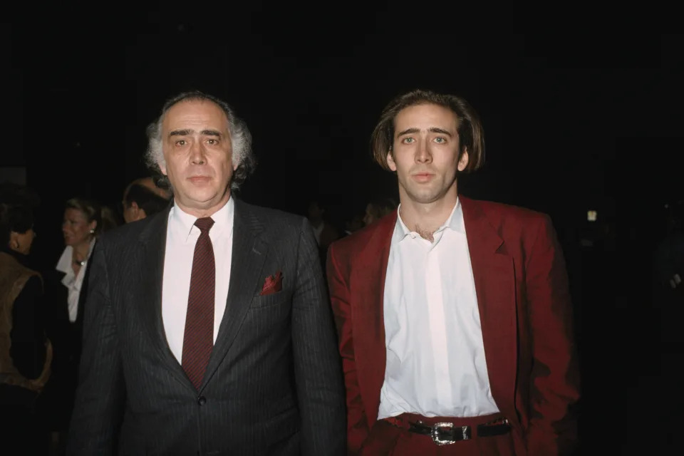American actor Nicolas Cage and his father August Coppola attend the premiere of Moonstruck, directed and produced by Canadian Norman Jewison. (Photo by Barry King/Sygma/Sygma via Getty Images)
