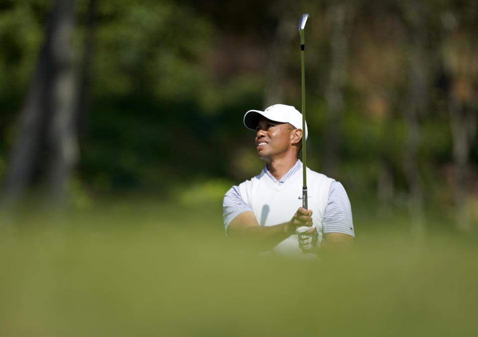 Tiger Woods watches his second shot on the fifth hole during the second round of the Genesis Invitational golf tournament at Riviera Country Club, Friday, Feb. 14, 2020, in the Pacific Palisades area of Los Angeles. (AP Photo/Ryan Kang)