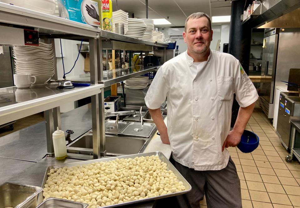 Ronnie Olsheski, executive chef at Pane Vino on the River, prepares a tray of gnocchi.