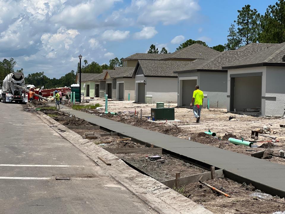 New homes under construction at Meritage Homes' new Links Terrace residential subdivision at LPGA International in Daytona Beach on July 26. 2023.