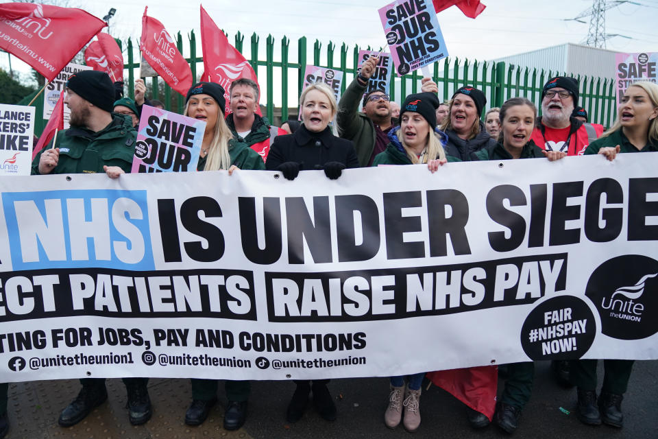 Unite union general secretary Sharon Graham (centre), joins ambulance workers on the picket line outside ambulance headquarters in Coventry, as paramedics, ambulance technicians and call handlers walk out in England and Wales, in a strike co-ordinated by the GMB, Unison and Unite unions over pay and conditions that will affect non-life threatening calls. Picture date: Wednesday December 21, 2022. (Photo by Jacob King/PA Images via Getty Images)