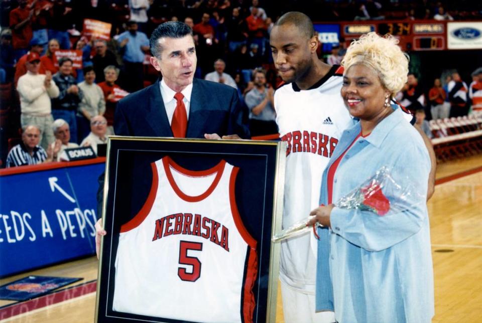 Larry Florence, center, is honored on senior day while playing for the University of Nebraska.