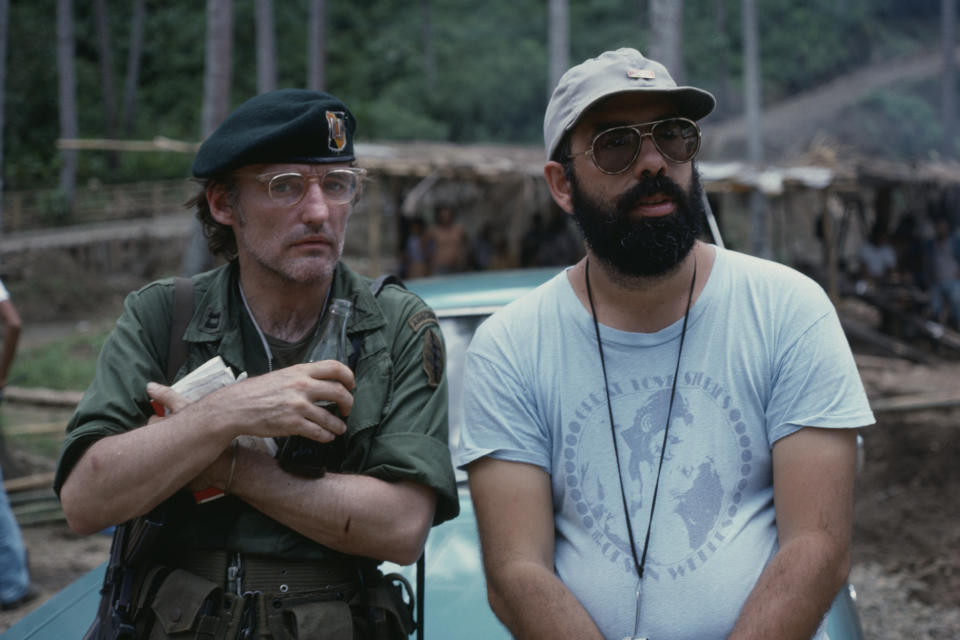 American actor Dennis Hopper with director Francis Ford Coppola on the set of the his movie Apocalypse Now, based on Joseph Conrad&#39;s novel Heart of Darkness. (Photo by &#xa9; Caterine Milinaire/Sygma via Getty Images)