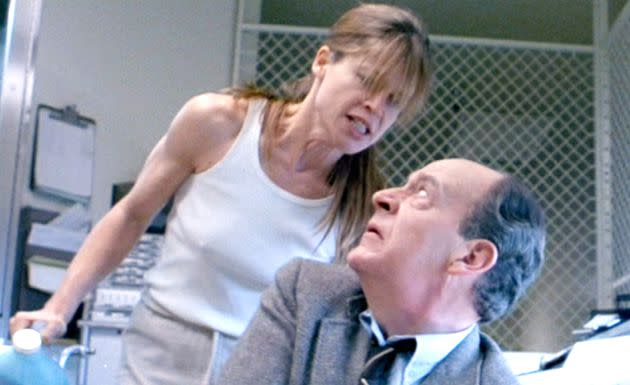 Linda Hamilton (as Sarah Connor) confronts Earl Boen's character Dr. Peter Silberman in a scene from 