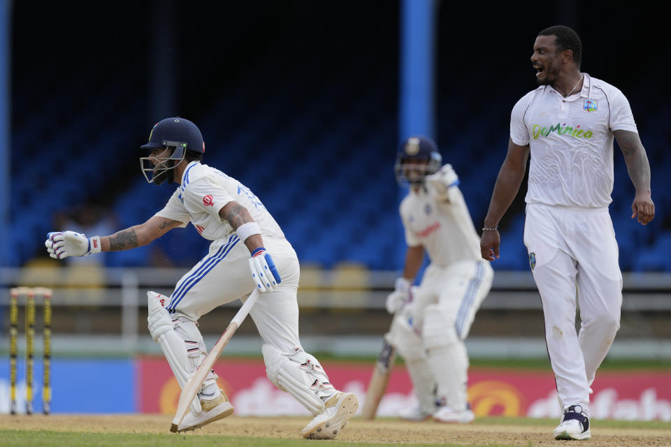 India's Virat Kohli left, scores runs from the bowling of West Indies' Shannon Gabriel, right, on day one of their second cricket Test match at Queen's Park in Port of Spain, Trinidad and Tobago, Thursday, July 20, 2023. (AP Photo/Ricardo Mazalan)