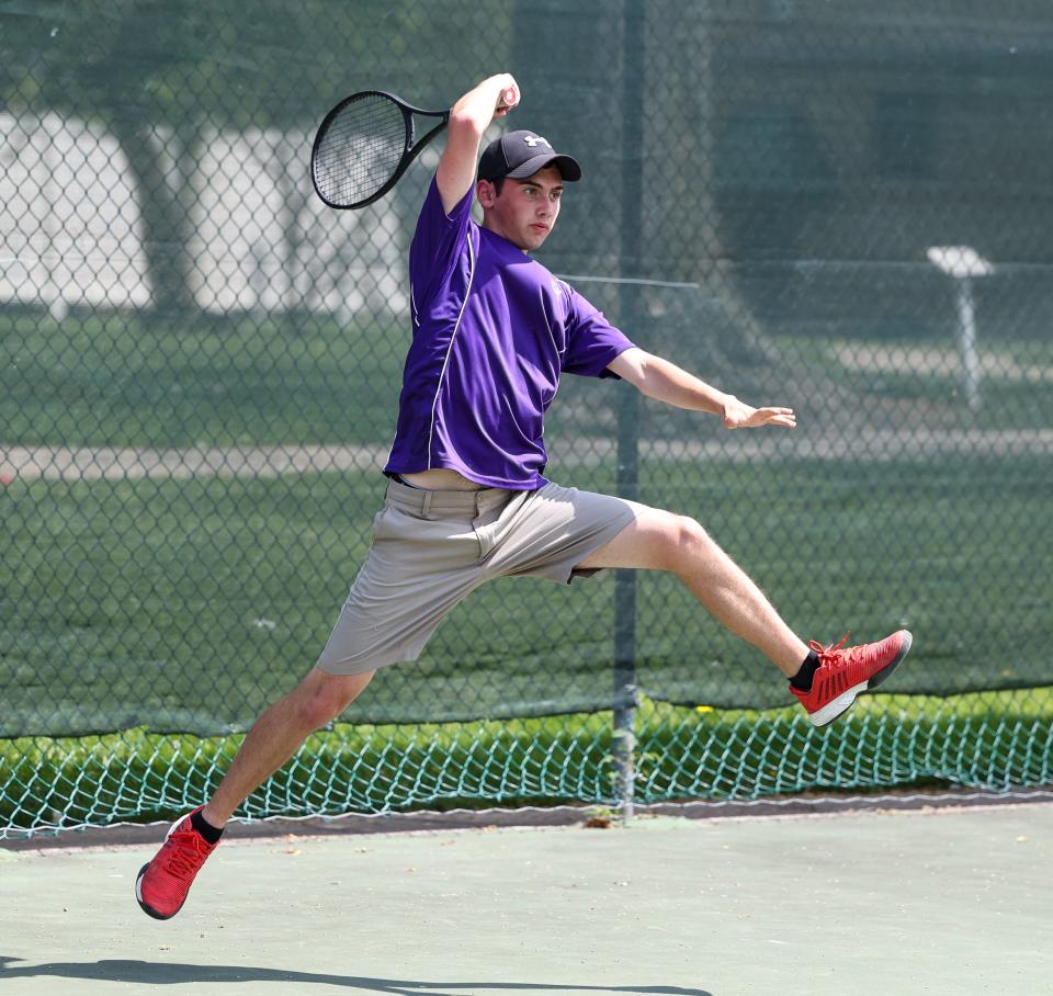 Triway's Paul Self gets lift off here on this return shot in the Div. II Wooster Sectional in his opening match of the day.