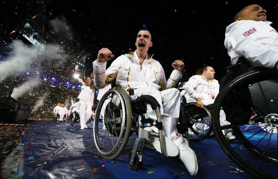 LONDON, ENGLAND - AUGUST 29: Wheelchair Rugby player David Anthony of Great Britain enjoys the atmosphere during the Opening Ceremony of the London 2012 Paralympics at the Olympic Stadium on August 29, 2012 in London, England. (Photo by Dan Kitwood/Getty Images)