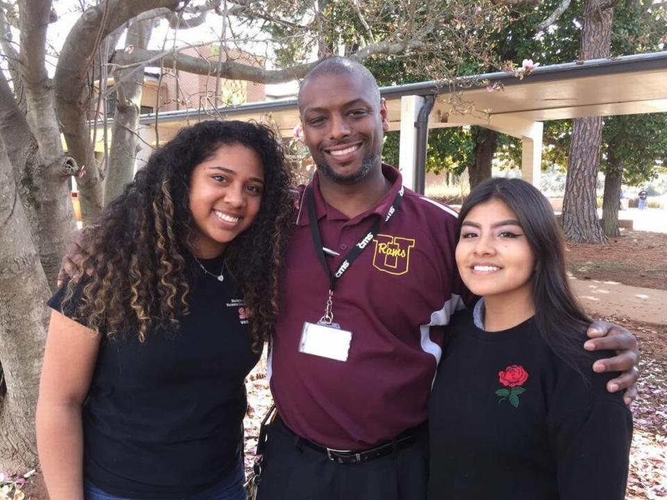 Harding Principal Eric Ward with students Carmen Sosa (left) and Lizzet Martinez, in 2017.